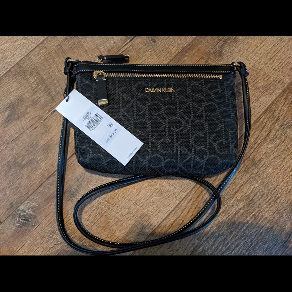 Calvin Klein “swing” crossbody bag